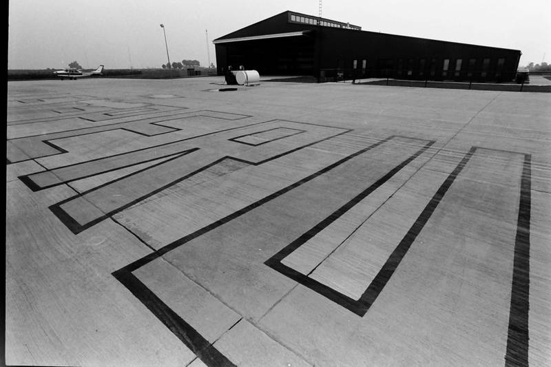 A view of the PERU letters outside the taxiway at the Illinois Valley Regional Airport in 1986.