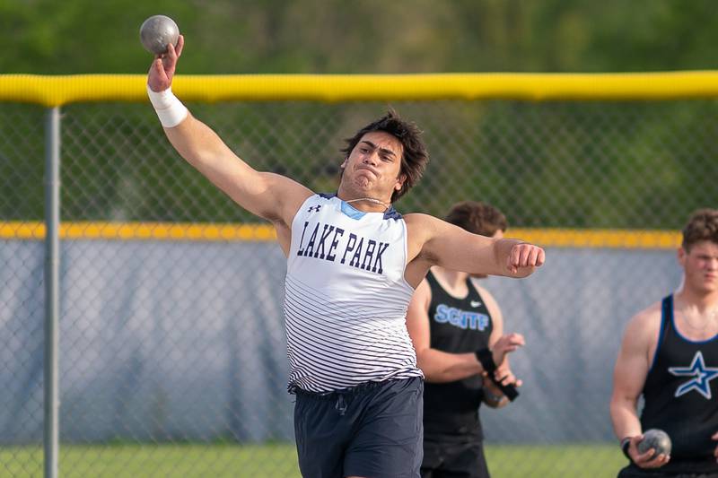 Lake Park’s Tyler Michelini warms up prior to the start of the varsity shot put competition during a DuKane Conference boys track and field meet at Geneva High School on Thursday, May 11, 2023.