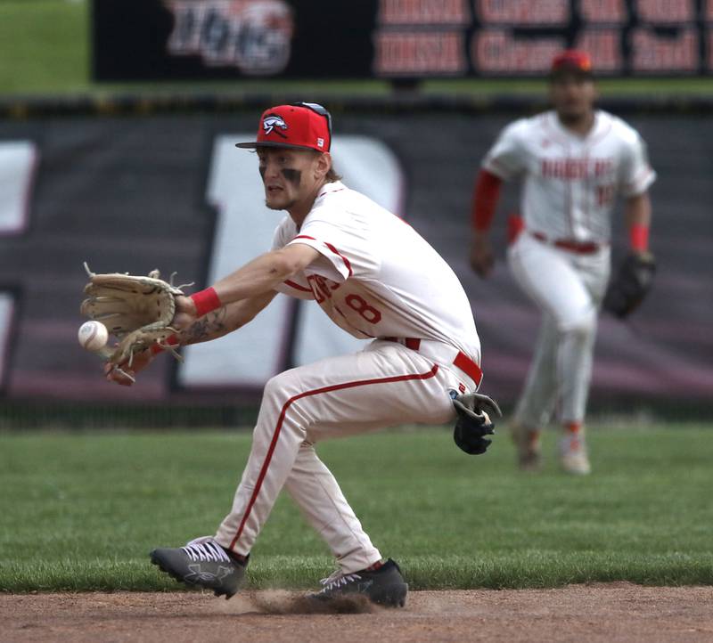 Huntley's Aiden Eickelman fields a ground ball during a Fox Valley Conference baseball game McHenry on Tuesday, May 8, 2026, at Huntley High School.