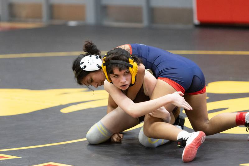 West Aurora's Melody Mireles  competes with Jacob's Emily Miller in the 115 lb class at the Batavia Girl's Invitational on Friday, Jan. 16,2026 in Batavia.