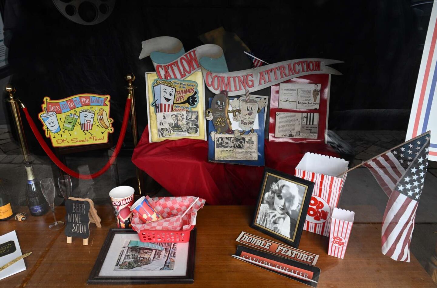 Window decor at the Catlow Theatre in Barrington offers a glimpse into the 1927-vintage theater’s past. Fans might recognize a portrait of 1930s movie queen Carole Lombard.