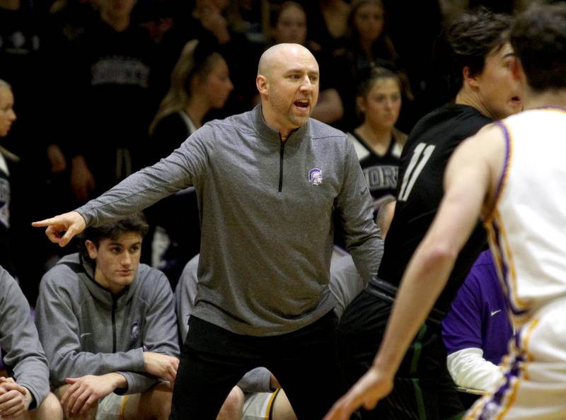 Downers Grove North Head Coach Jim Thomas yells to his team during a game against Glenbard West at Downers Grove North on Friday, Jan. 13, 2023.