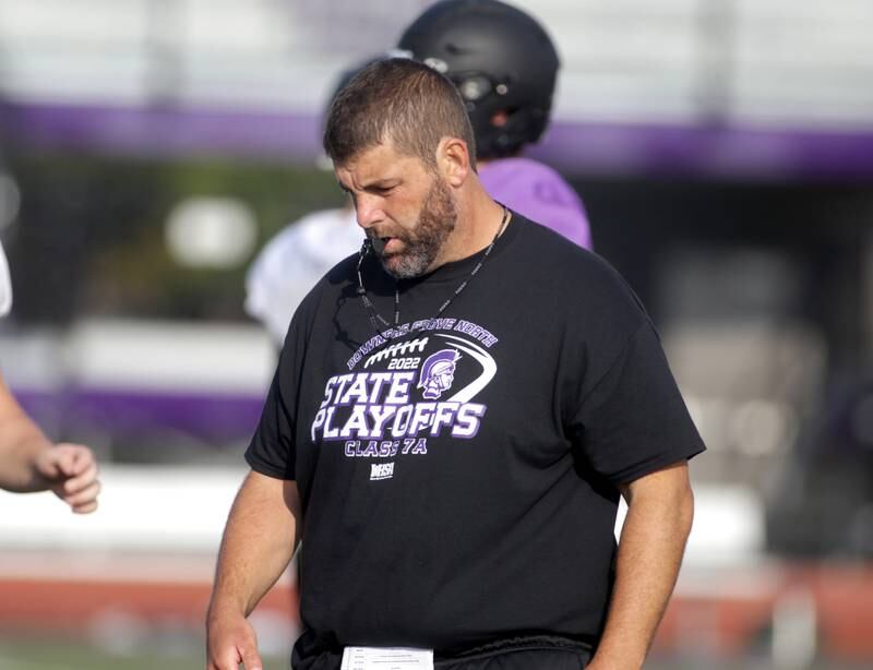 Downers Grove North Head Coach Joe Horeni leads a practice at the school on Tuesday, Aug. 15, 2023.