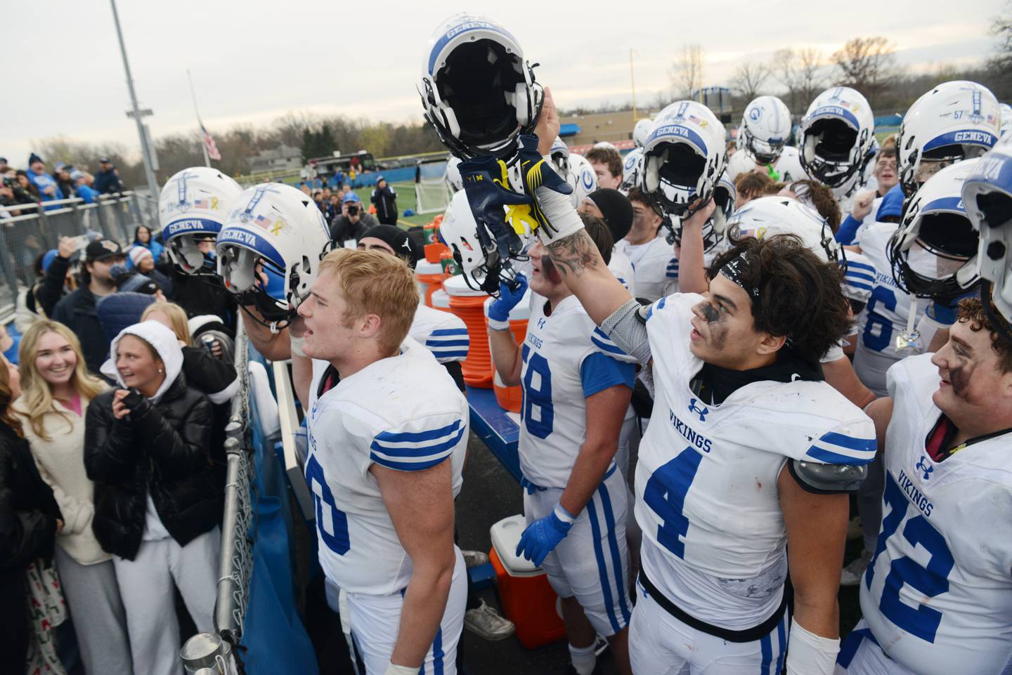 Geneva players celebrate in front of fans following their 49-14 victory over Lake Forest during the Class 6A football quarterfinal game on Saturday, Nov. 16, 2024 in Lake Forest.