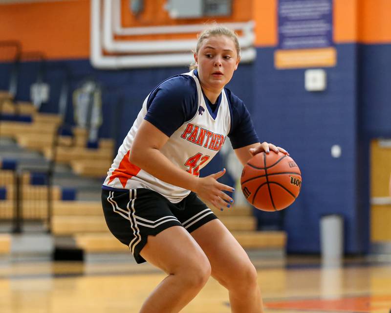Oswego's Kendall Grant spins to the basket at the Oswego Girls Basketball Shootout . June 30, 2023.