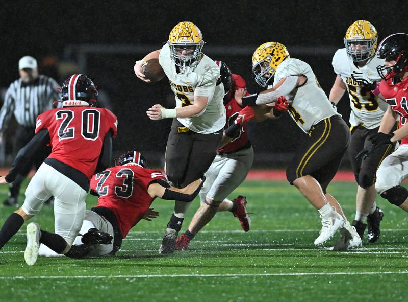 Jacob's Ryan Tucker runs the ball during the class 7A first round  playoff game on Friday, Oct. 27, 2023, at New Lenox. (Dean Reid for Shaw Local News Network)