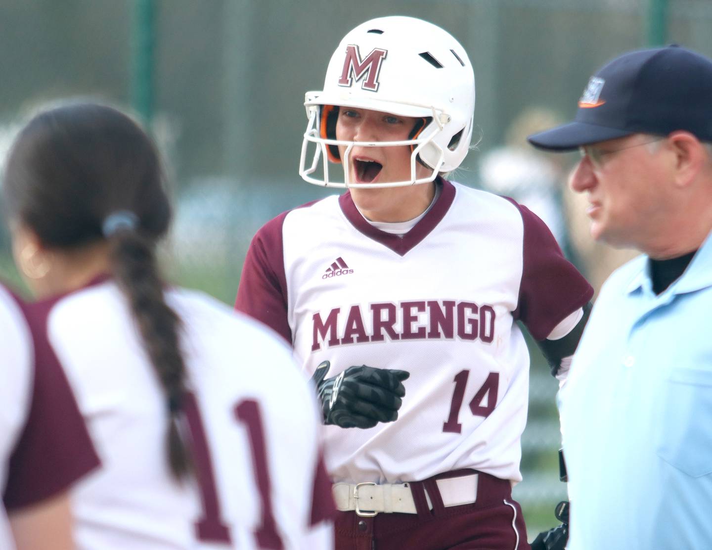 Marengo’s Kylee Jensen celebrates the first of her two home runs against Richmond-Burton in varsity softball on Tuesday, April 22, 2025, at Marengo High School in Marengo.