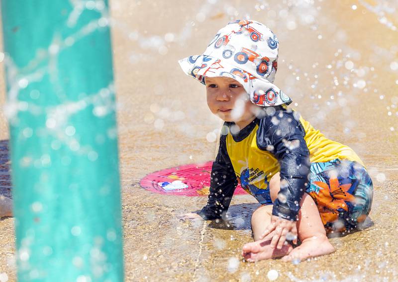 Jaxon Neubauer, 1,  of Rock Falls explores the Water Wonderland splash pad Wednesday, June 11, 2025, in Dixon.