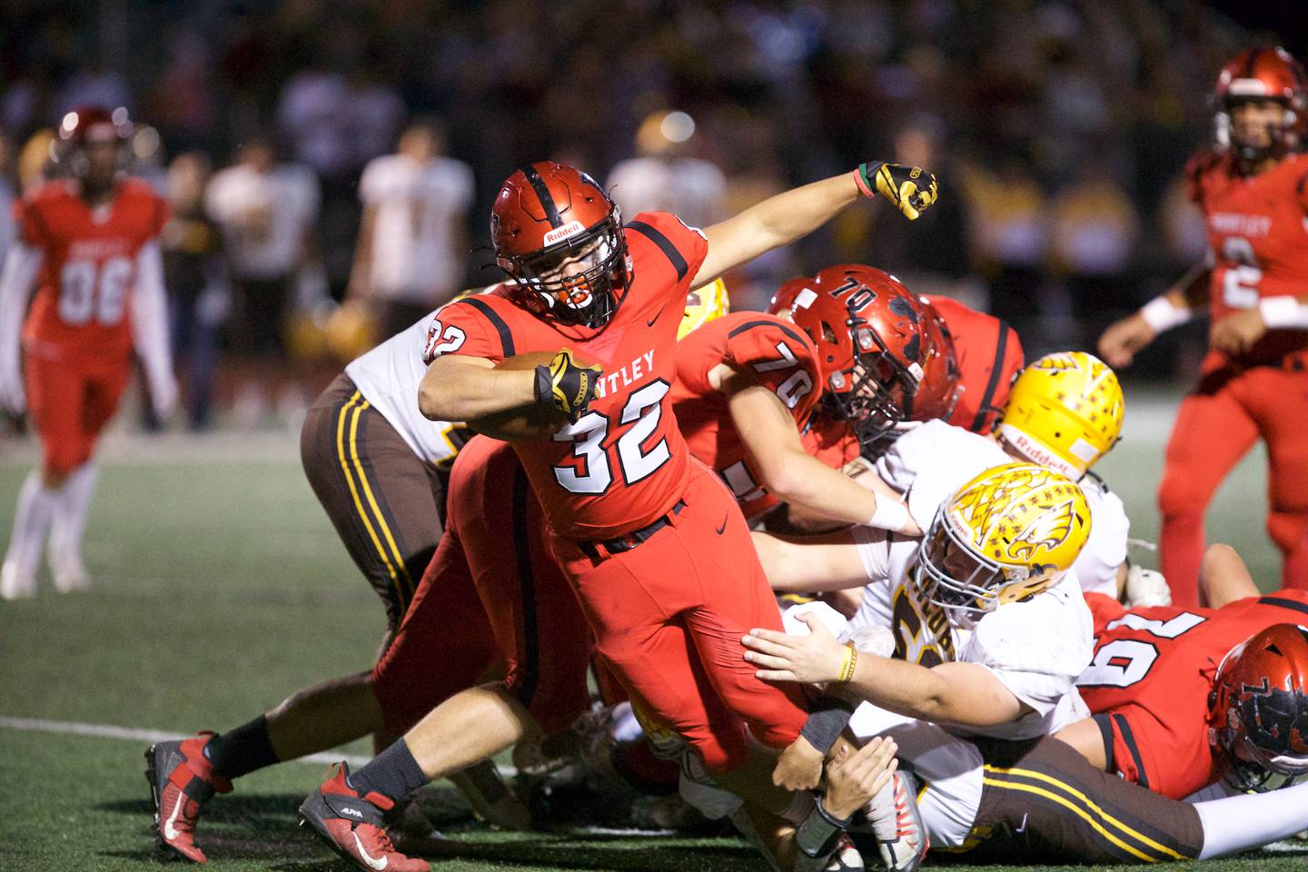 Huntley's Zach Rios is tackled by Jacobs defense on Friday, Sept. 23,2022 in Huntley.