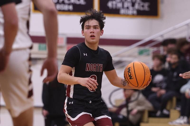 Plainfield North’s Lukas Alvarez looks for a play gainst Lockport on Friday, Jan. 3, 2025 in Lockport