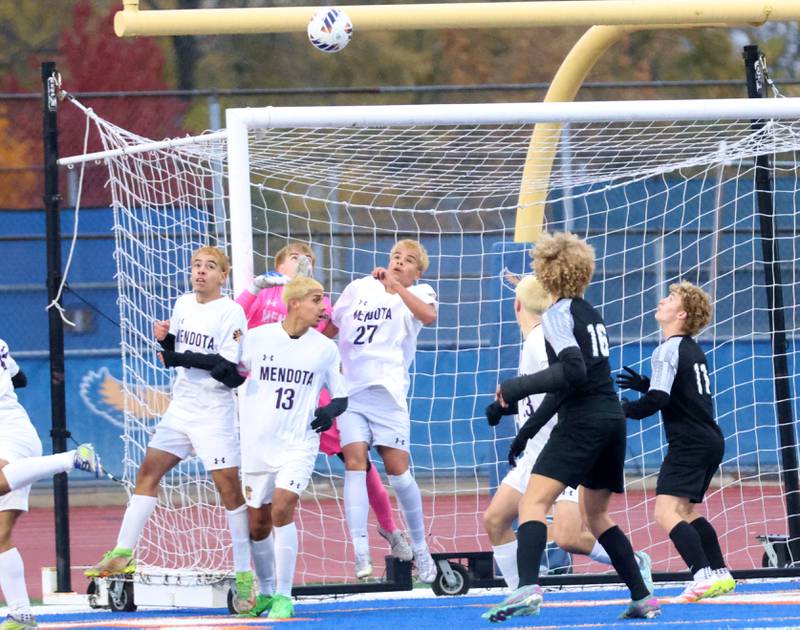 The ball sails over the heads of Mendota defenders during the Class 1A State title game on Saturday, Nov. 8, 2025 at Hoffman Estates High School.