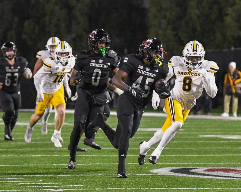 Northern Illinois University's running back Telly Johnson Jr. (45) runs the ball in for a touchdown during the first quarter on Saturday Nov. 18, 2025; while taking on Western Michigan held at Huskie Stadium in DeKalb.