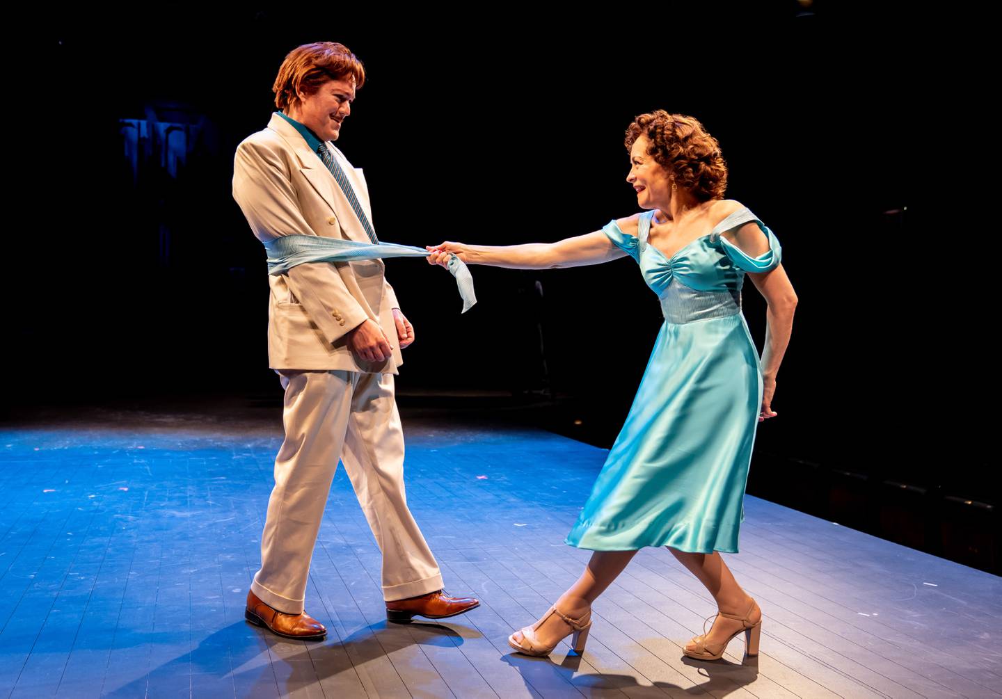 Antipholus of Syracuse (Robert Petkoff) is seduced by Adriana (Susan Moniz) in Chicago Shakespeare Theater’s production of Shakespeare’s The Comedy of Errors, directed by Barbara Gaines, in the Courtyard Theater, March 9–April 16, 2023. Photo by Liz Lauren