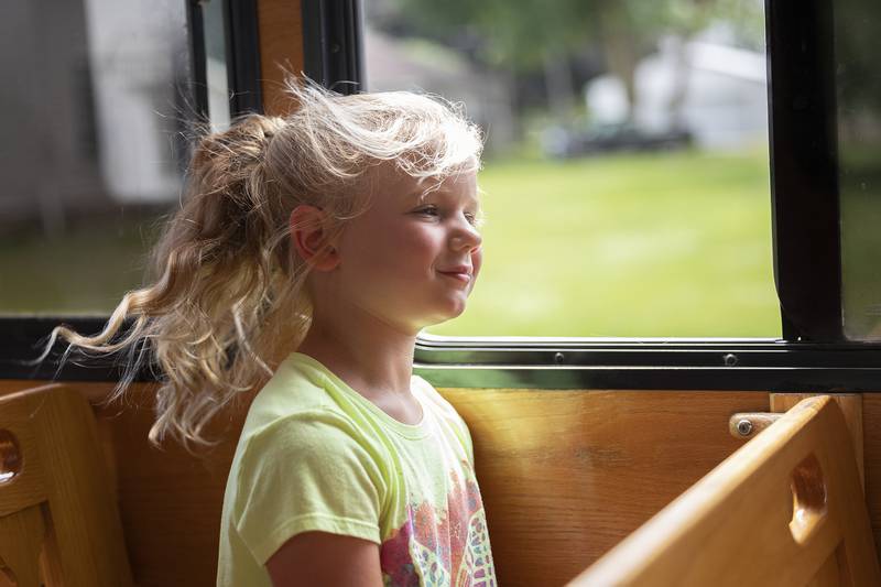 Evynn Sanders, 5, of Polo, enjoys the cool breeze coming from the trolley Saturday, June 28, 2025, during a tour of Polo’s Underground Railroad history.