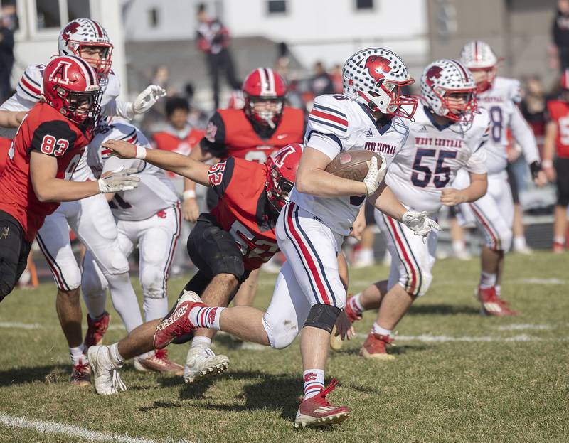 West Central’s Graham Kelly runs against Amboy Saturday, Nov. 2, 2024, in the 8-man football league first round playoffs.