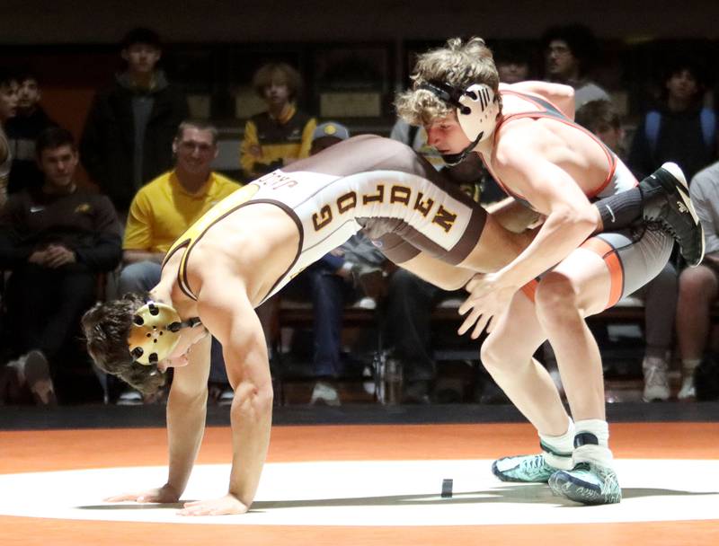Crystal Lake Central’s Daniel Zuehlke, right, battles Jacobs’ Andrew Vormittag at 138 pounds in varsity boys wrestling on Tuesday, Jan. 20, 2026 at Crystal Lake Central High School in Crystal Lake.