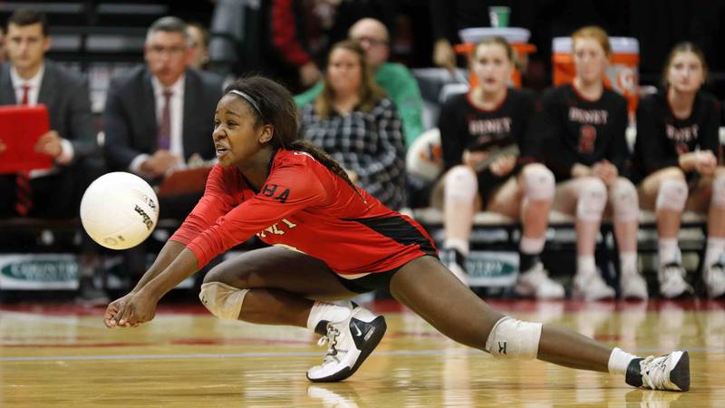 Benet's Aniya Warren (8) during the IHSA Class 4A girls volleyball state title game between Benet Academy and Mother McAuley Saturday November 12, 2022 at Redbird Arena in Normal.