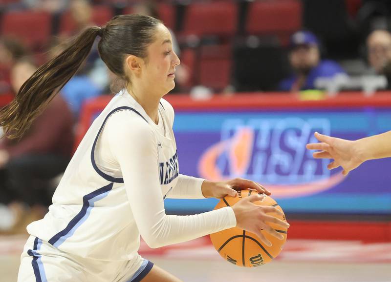 Nazareth's Samantha Austin dribbles the ball against Loyola during the Class 4A State girls basketball championship game on Saturday, March 7, 2026 at CEFCU Arena in Normal.