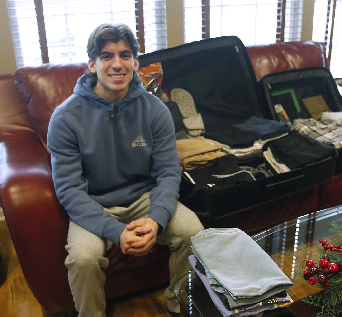 Brady Bird on Thursday, Jan. 19, 2023, in his home in Lake In The Hills before he travels to Canterbury Christ Church University in Canterbury, England, to be McHenry County College's first study abroad student since March 2020.