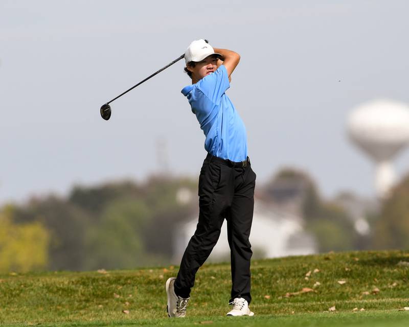 Logan Hong of Oswego East watches his ball after teeing off the tee box during the Plainfield Central regional on Wednesday Oct. 1, 2025, held at Wedgewood Golf Course in Plainfield.