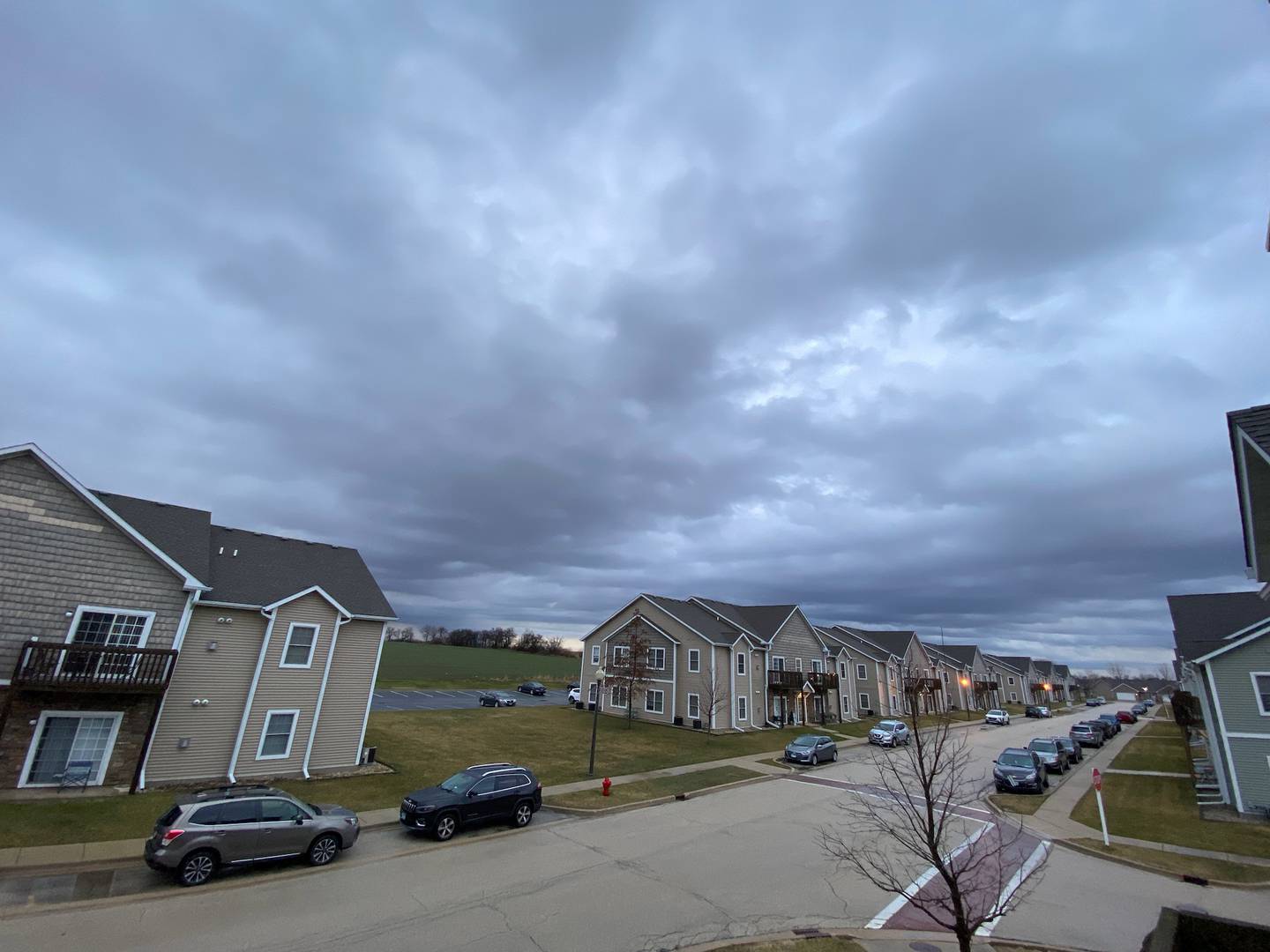 Storm clouds stacked low over Sycamore in the Stone Prairie rental community Friday, March 31, 2023.