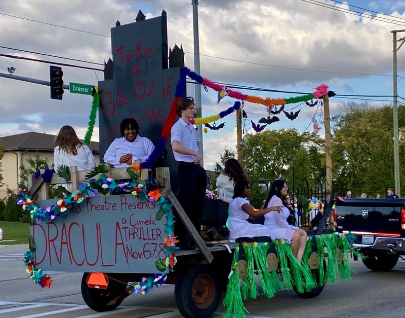 Members of the DeKalb High School Theater get in character for the annual DeKalb High School Homecoming Parade to promote their upcoming show "Dracula: A Comic Thriller" on Wednesday, Sept. 24, 2025, along West Dresser Road.