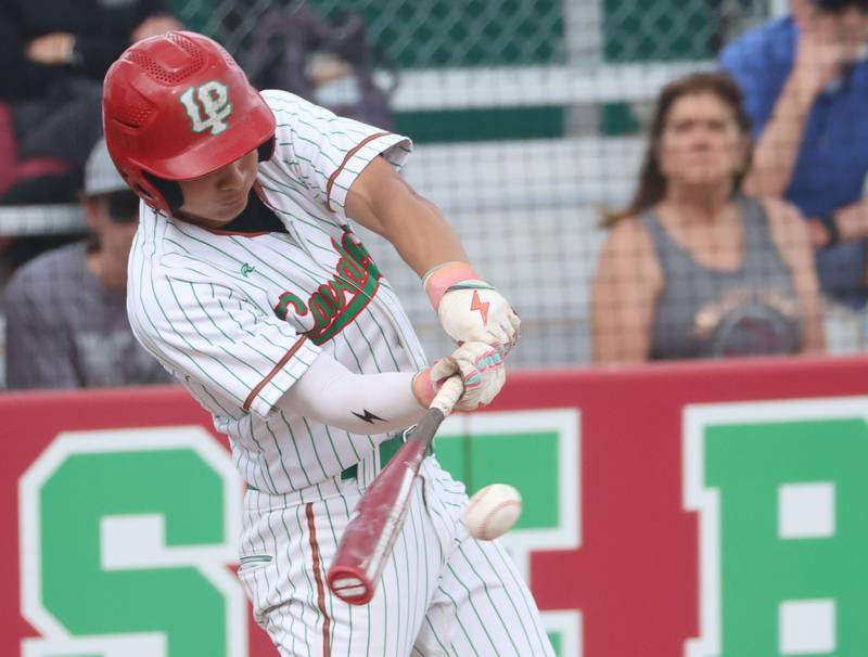 L-P's Adan Pantoja makes contact with the ball on Friday, April 17, 2026 at Huby Sarver Field in the L-P Athletic Complex in La Salle.