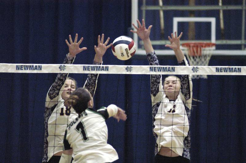 RF's Kacie Witherow hits a ball  past Sherrard defenders. Rock Falls took on Sherrard in the Class 2A regional volleyball semifinal Tuesday, Oct. 29, 2024 at Newman High School.