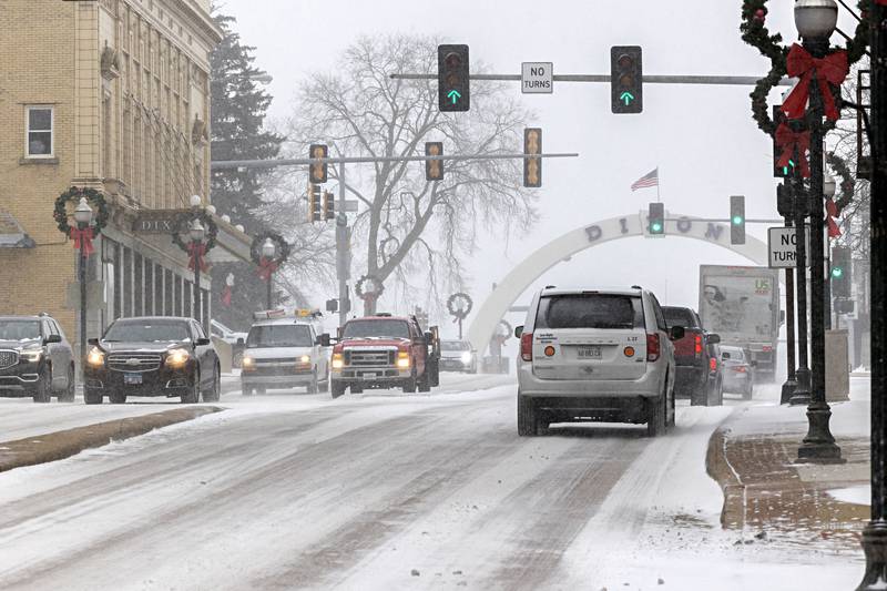Travel was slick and slow in Dixon Thursday as drifting snow and icy conditions coated the roadways.