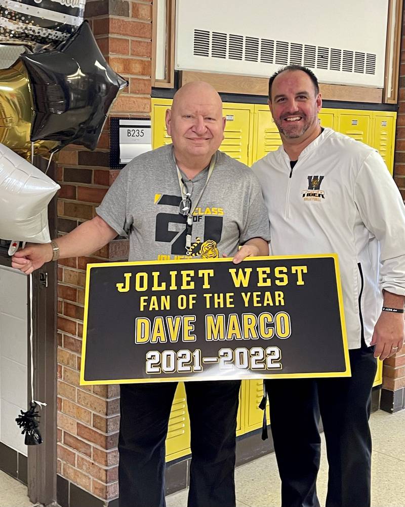 Longtime Joliet West High School Dave Marco posts with Joliet West athletic director at West. Steve Millsaps.