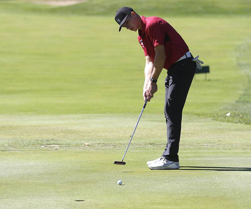 Huntley’s Brendan Buskylines putts on the 18th green during the IHSA Boys’ Class 3A Sectional Golf Tournament Monday, Oct. 3 2022, at Randall Oaks Golf Club in West Dundee.