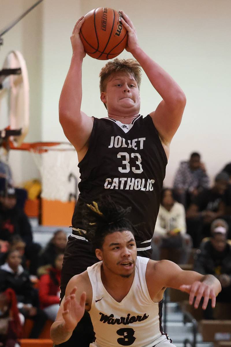 Joliet Catholic’s Anthony Birsa pulls in the high pass against Prespectives in the Class 2A Julian Sectional championship on Friday, March 3rd, 2023 in Chicago.