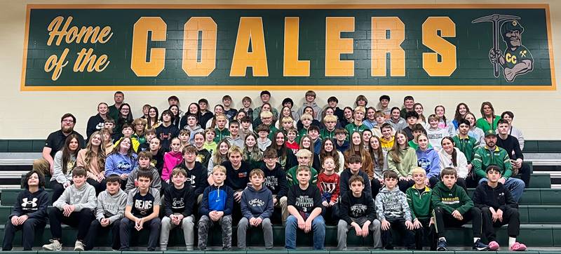 Out of approximately 500 member schools, the Illinois Elementary School Association honors one school a month across seven months of the academic year at its Sportsmanship of the Month School. The honorees are selected from the Good Sports Reports submitted by the IESA Officials Advisory Committee and Coal City Middle School was recognized for the month of February. The students pictured represent the wrestling, seventh and eighth grade volleyball, and seventh and eighth grade basketball teams.