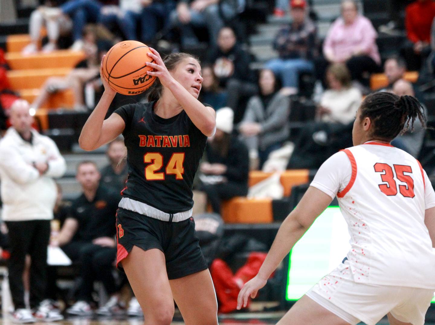 Batavia’s Hallie Crane looks to pass the ball during a game against St. Charles East on Wednesday, Jan. 8, 2025 in St. Charles.