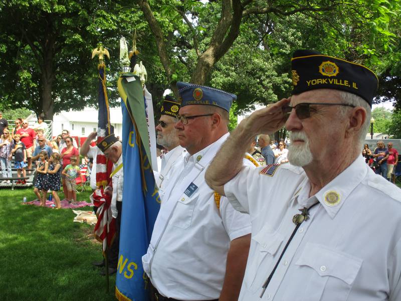 U.S. Marine Corps veteran Ken Havelka of Yorkville and his fellow American Legion Post 489 honor guard comrades stand at attention for the National Anthem during Yorkville's Memorial Day ceremonies on May 30, 2022 at Town Square Park. (Mark Foster -- mfoster@shawmedia.com.)