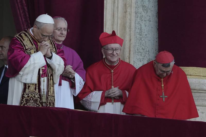 Newly elected Pope Leo XIV appears at the balcony of St. Peter's Basilica at the Vatican, Thursday, May 8, 2025. (AP Photo/Markus Schreiber)