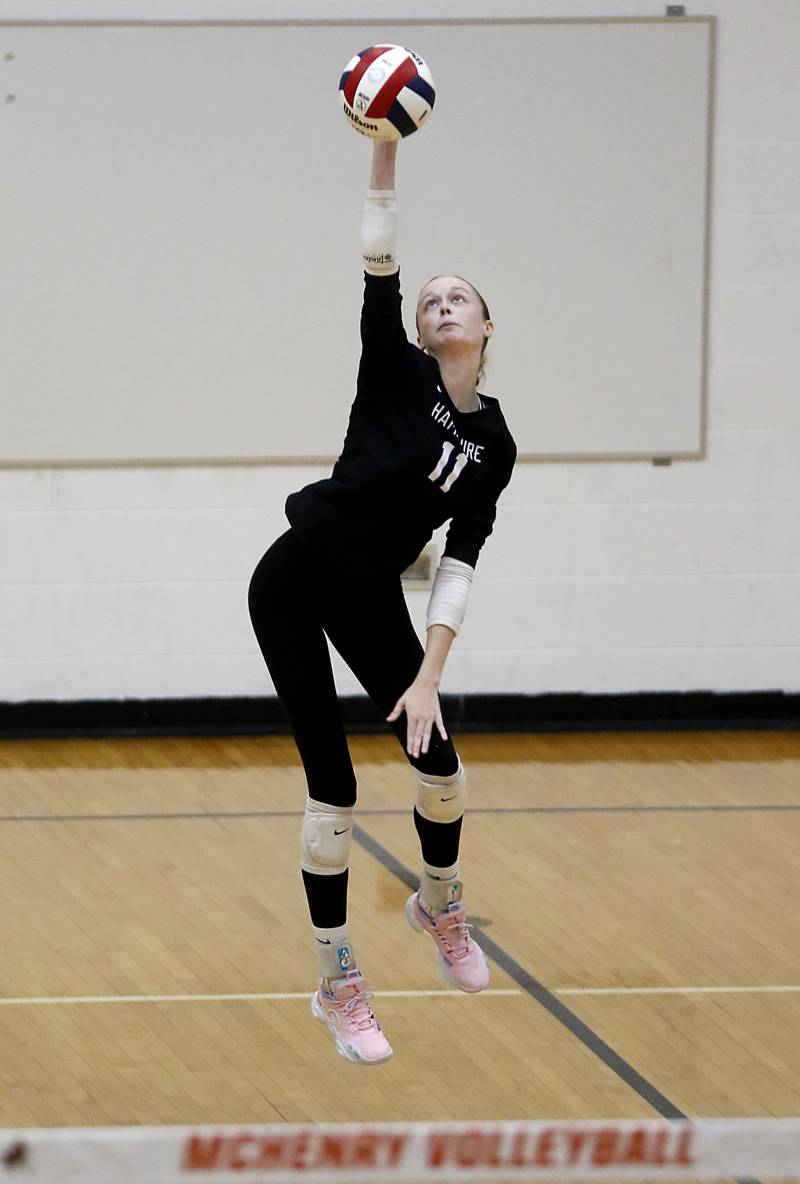 Hampshire's Jorah Rutter serves the ball during an IHSA Class 4A McHenry Sectional volleyball match against Libertyville on Tuesday, Nov. 5, 2024, at McHenry High School Freshman Campus.