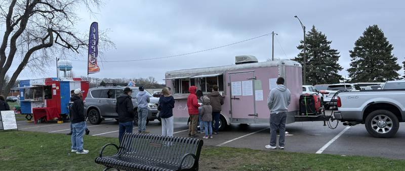 People line up at Kendall's Coffee during Ottawa's Easter Egg Hunt on Saturday, April 4 at Peck Park in South Ottawa.