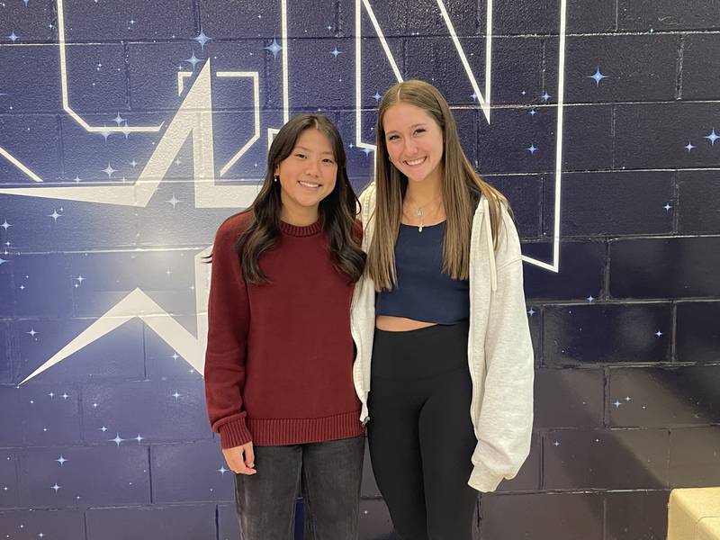 St. Charles North junior Shannon Lu (left) and freshman Danielle Dejanovich pose together at St. Charles North High School. Photo by Jacob Bartelson.