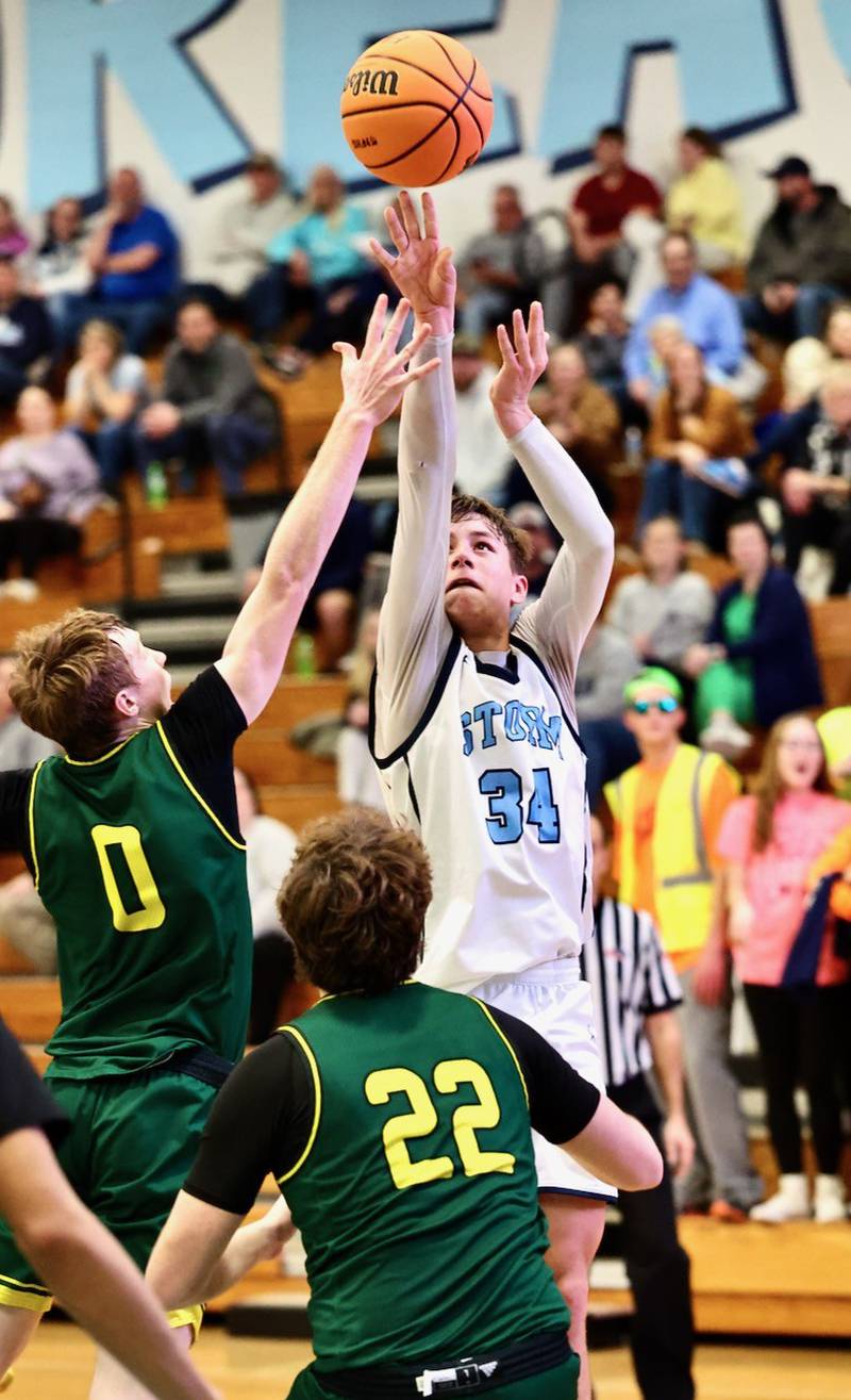 Bureau Valley's Carson Gruber fires away against Abingdon-Avon's Tre Kenon for the game-tying basket Friday night at the Storm Cellar. A-Town won 47-45.