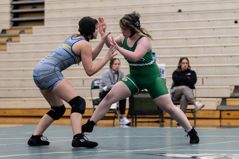 Joliet Central's Jaylin Ingram takes on Niamh Patterson of Plainfield Central in the 145-pound match at Plainfield Central on January 13, 2025.