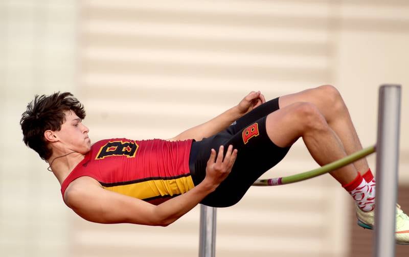 Batavia’s Alec Crum clears the bar in the high jump competition during the Class 3A Batavia track and field sectional on Thursday, May 18, 2023.