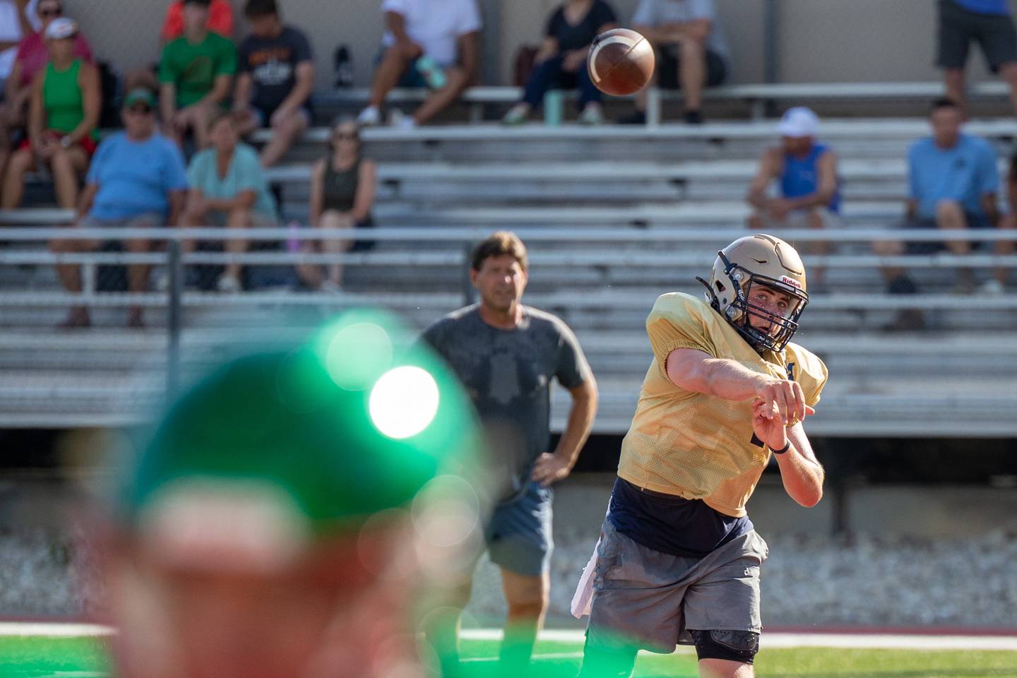 Anthony Couch of Marquette throws football during scrimmage on Tuesday July 16, 2025 at Howard Fellows Stadium in LaSalle.