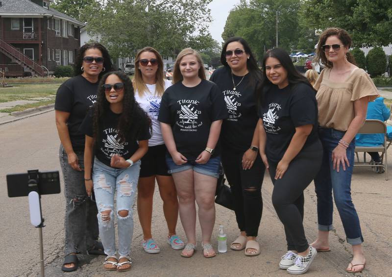 St. Margaret's Healthcare workers pose for a photo during a gathering outside the 9th Street Pub on Friday, June 16, 2023 in La Salle. Their shirts read "Titanic 2023 Swam until the end #SMHStrong.