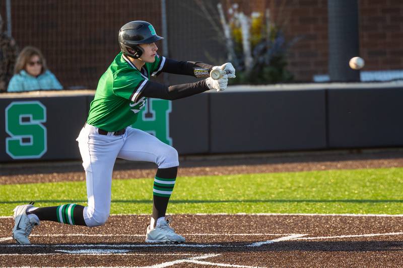 Brady Haines (6) of Seneca bunts on Friday, April 11, 2025 at Seneca High School in Seneca.
