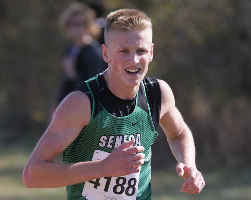Seneca's Austin Aldridge runs in the Class 1A Regional Cross Country boys race on Saturday, Oct. 22, 2022 at the Seneca FFA Farm in Marseilles.