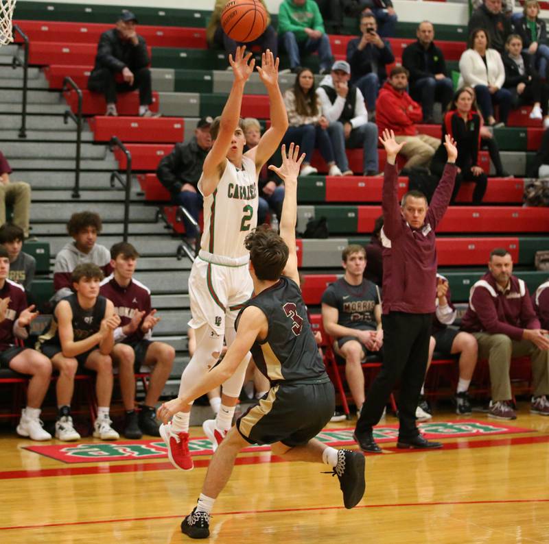 L-P's Seth Adams shoots a jump shot over Morris's Charlie Wright in Sellett Gymnasium on Friday, Jan. 13, 2023 at L-P High School.