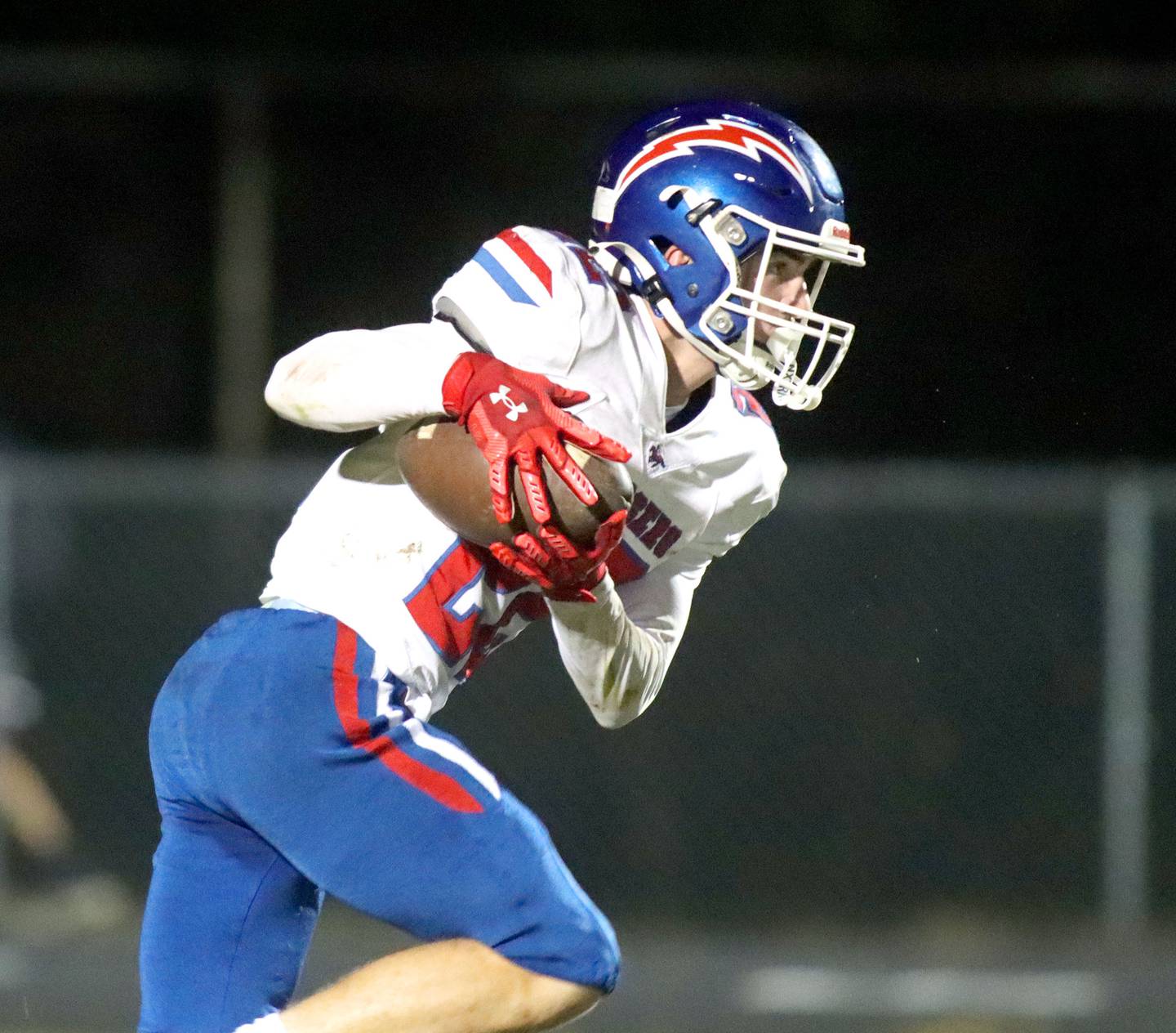 Dundee-Crown’s Kyle Pierce returns a kickoff in varsity football  at Jacobs High School in Algonquin on Friday, Oct. 10, 2025.