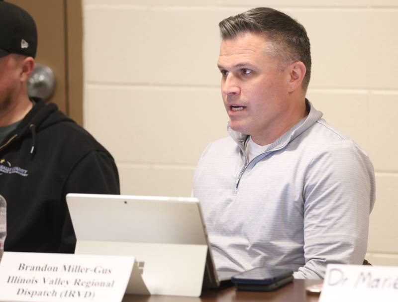Illinois Valley Regional Dispatch (IVRD) director Brandon Miller speaks during the Starved Rock Safety Update meeting on Monday, May 11, 2026 at the Utica Fire Station. The meeting serves as an opportunity to discuss safety, visitor experience, and general updates related to the park.