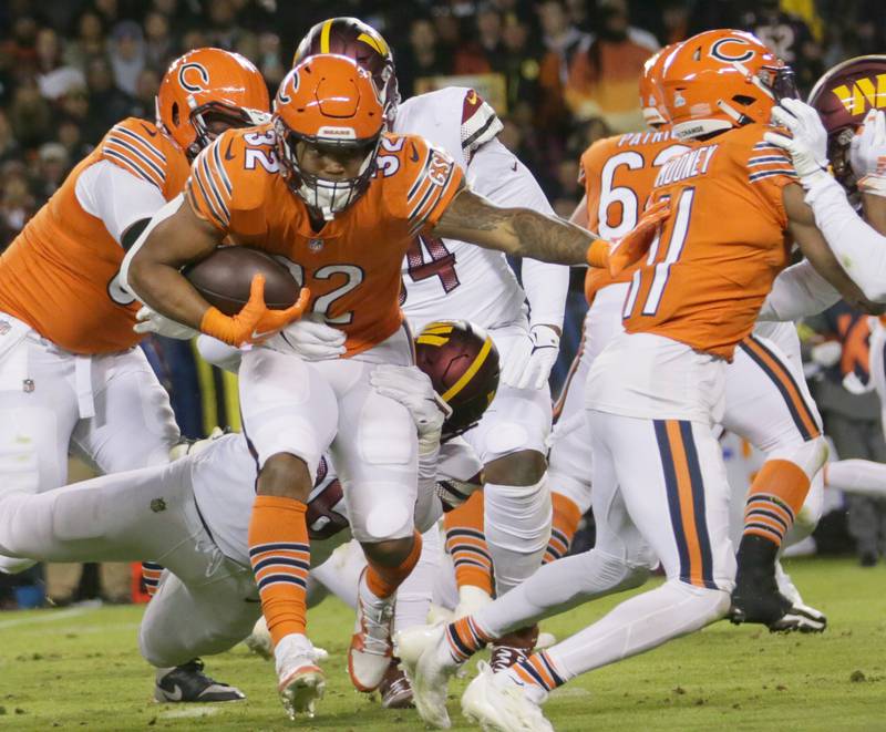 Chicago Bears running back David Montgomery (32) runs with the football against the Washington Commanders on Thursday, Oct. 13, 2022 at Soldier Field.